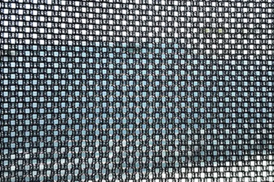 Macro view of the woven mesh used in side-window shades